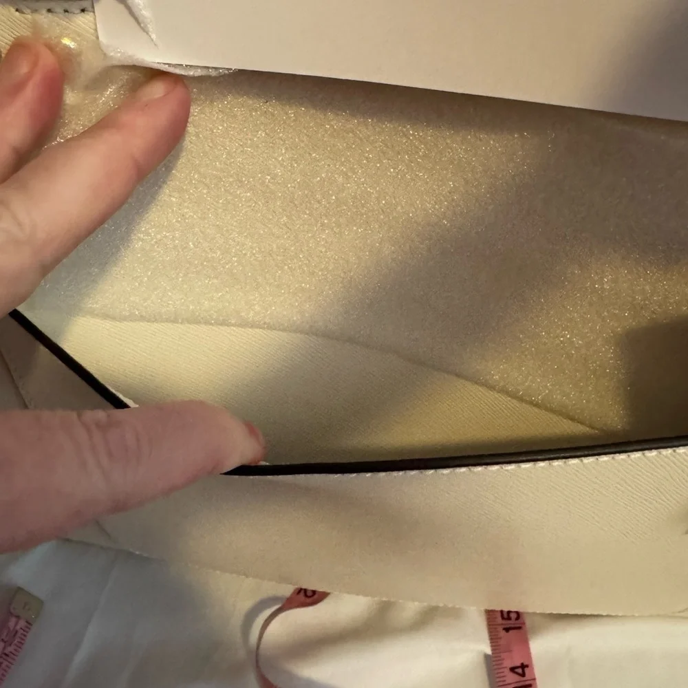 kate spade Cream Tote with Decorative Cutouts and Scarf Accent